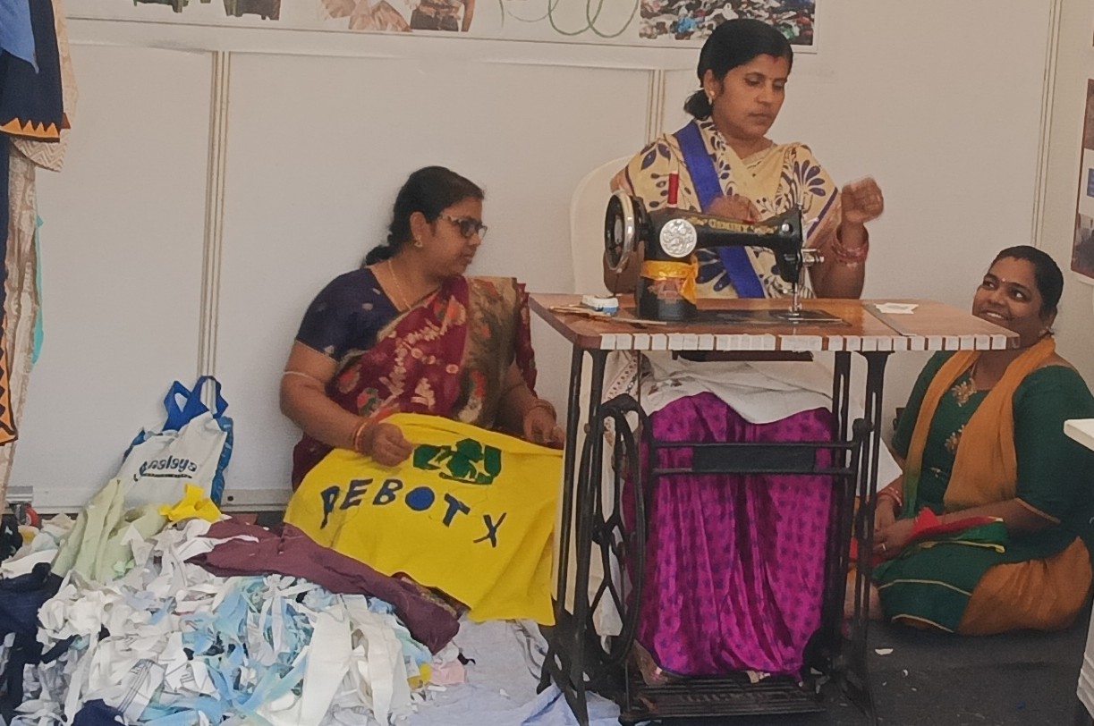 REBOTX artisans working with recovered fabric, appliqué and sewing